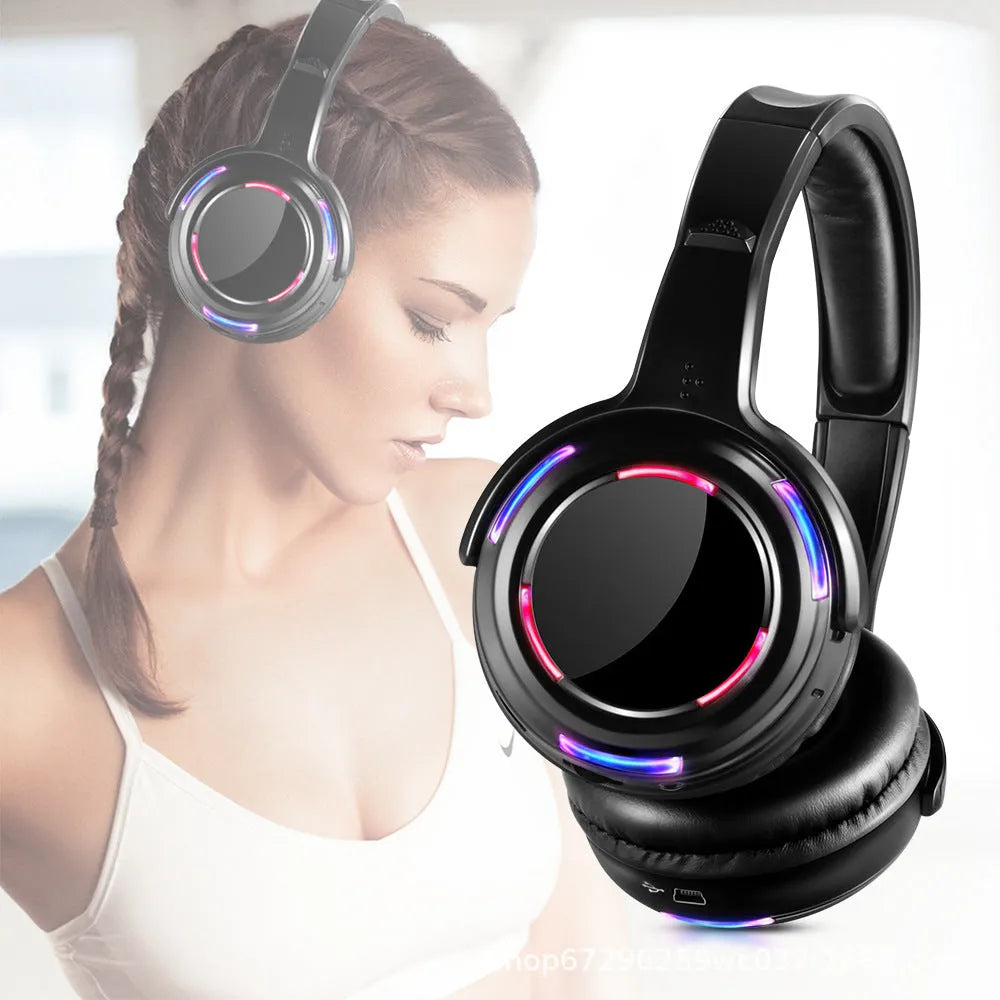 Black silent disco wireless headphones with head-mounted design and 3.5mm connection cable