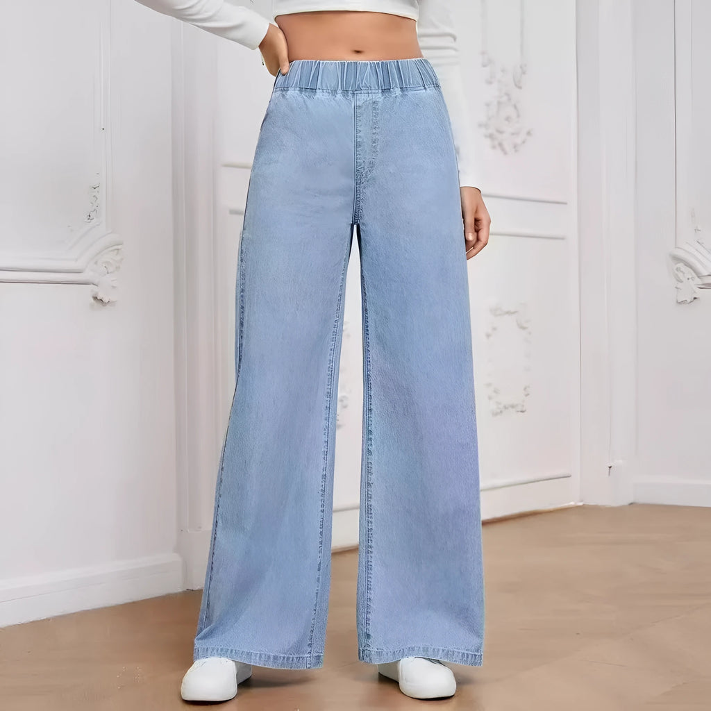 Light blue washed wide-leg denim trousers with straight cut and zip placket fly