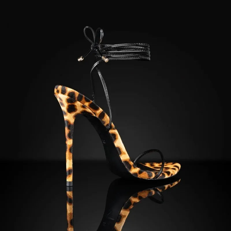 Women's leopard print Roman sandals with pointed toe and lace-up buckle fastening