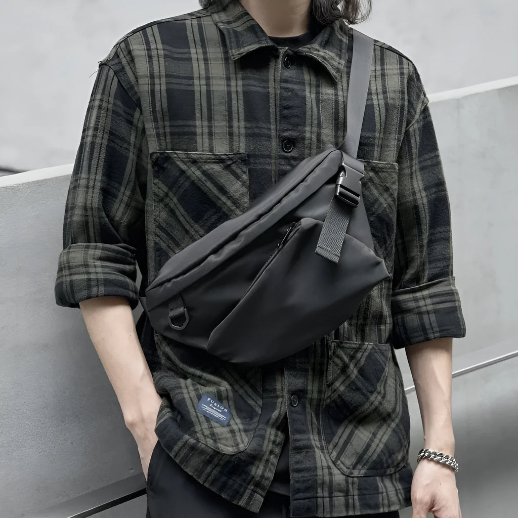 Black men's slanted chest bag made from Oxford fabric with 8-inch capacity and street trend style