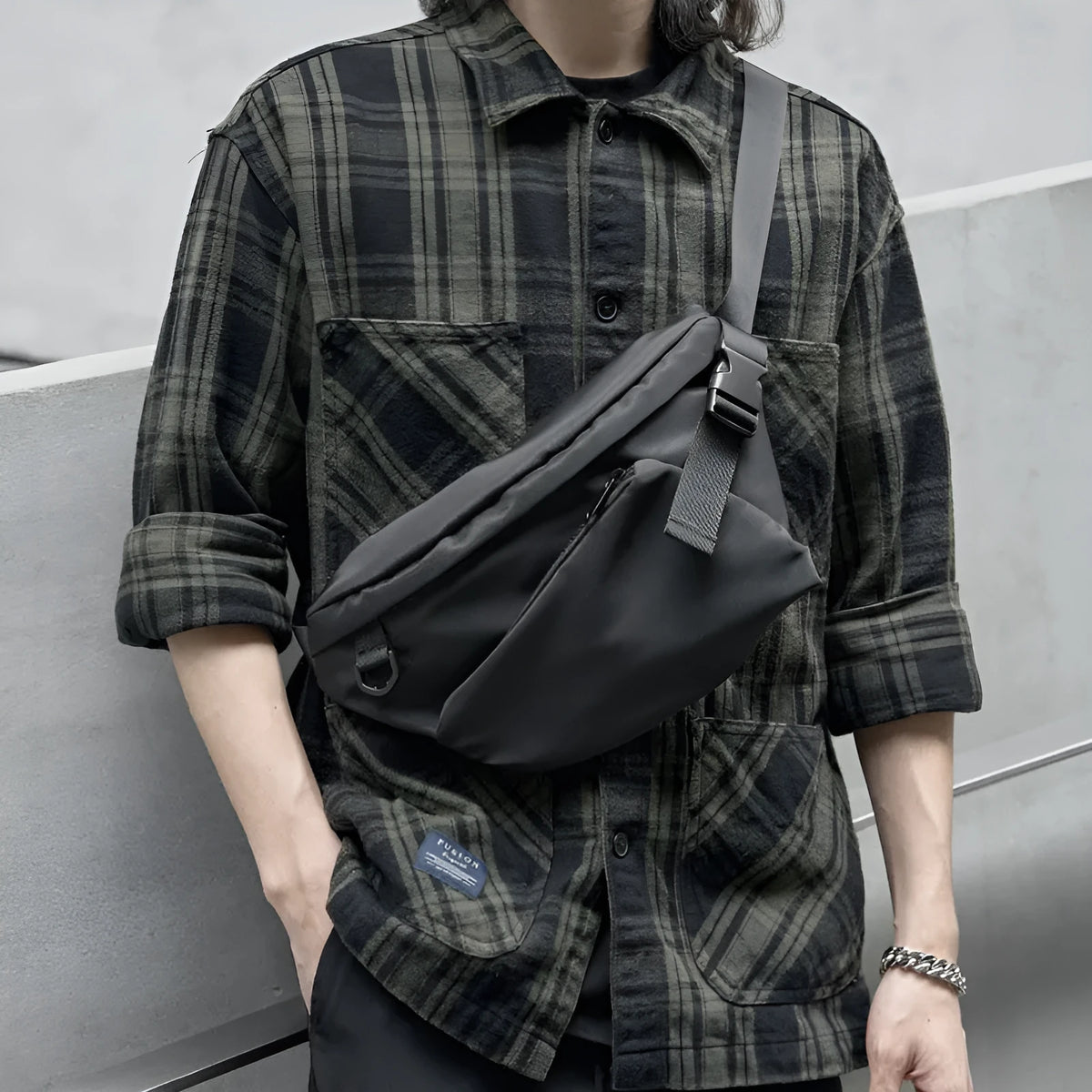 Black men's slanted chest bag made from Oxford fabric with 8-inch capacity and street trend style