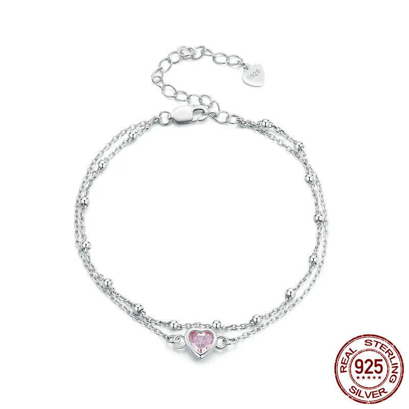 Women's sweet heart-shaped 925 sterling silver bracelet with adjustable chain on wrist