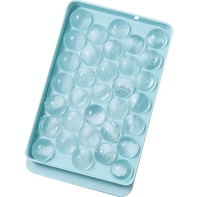 Blue PE ice cube tray with lid showing 33 round moulds.