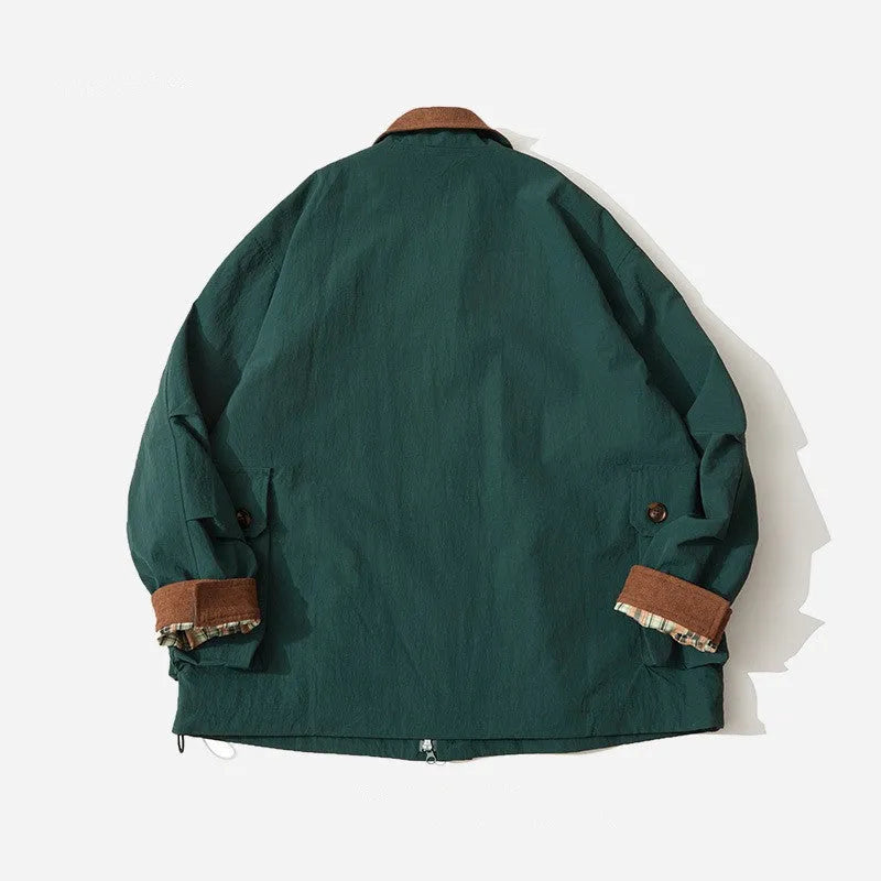 Green and apricot coloured casual jacket with side seam pockets on a mannequin
