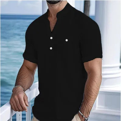 Man's light blue linen blend t-shirt with stand collar and short sleeves in a loose fit.