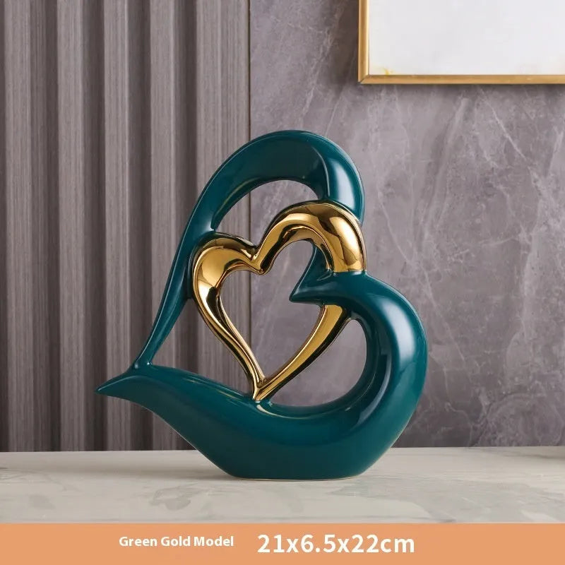 Modern white porcelain love heart ornament with a choice of metallic gold, silver and coloured finishes.