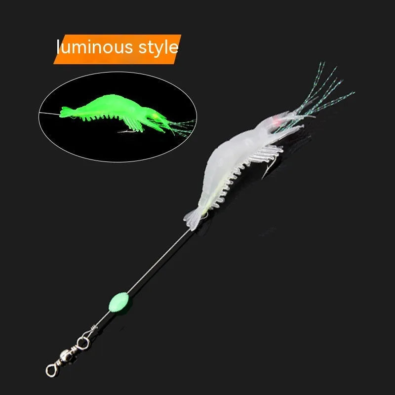 Soft plastic fishing lure with metal hook in black head yellow body colour variant