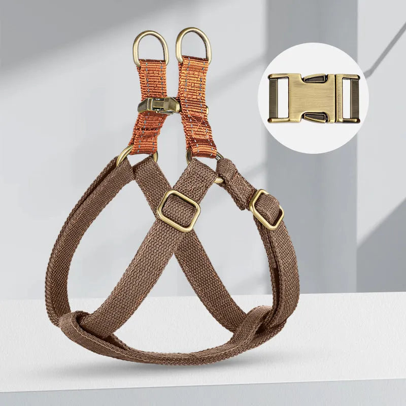Brown vest-style anti-loss dog leash made of cotton and nylon with alloy fastener.