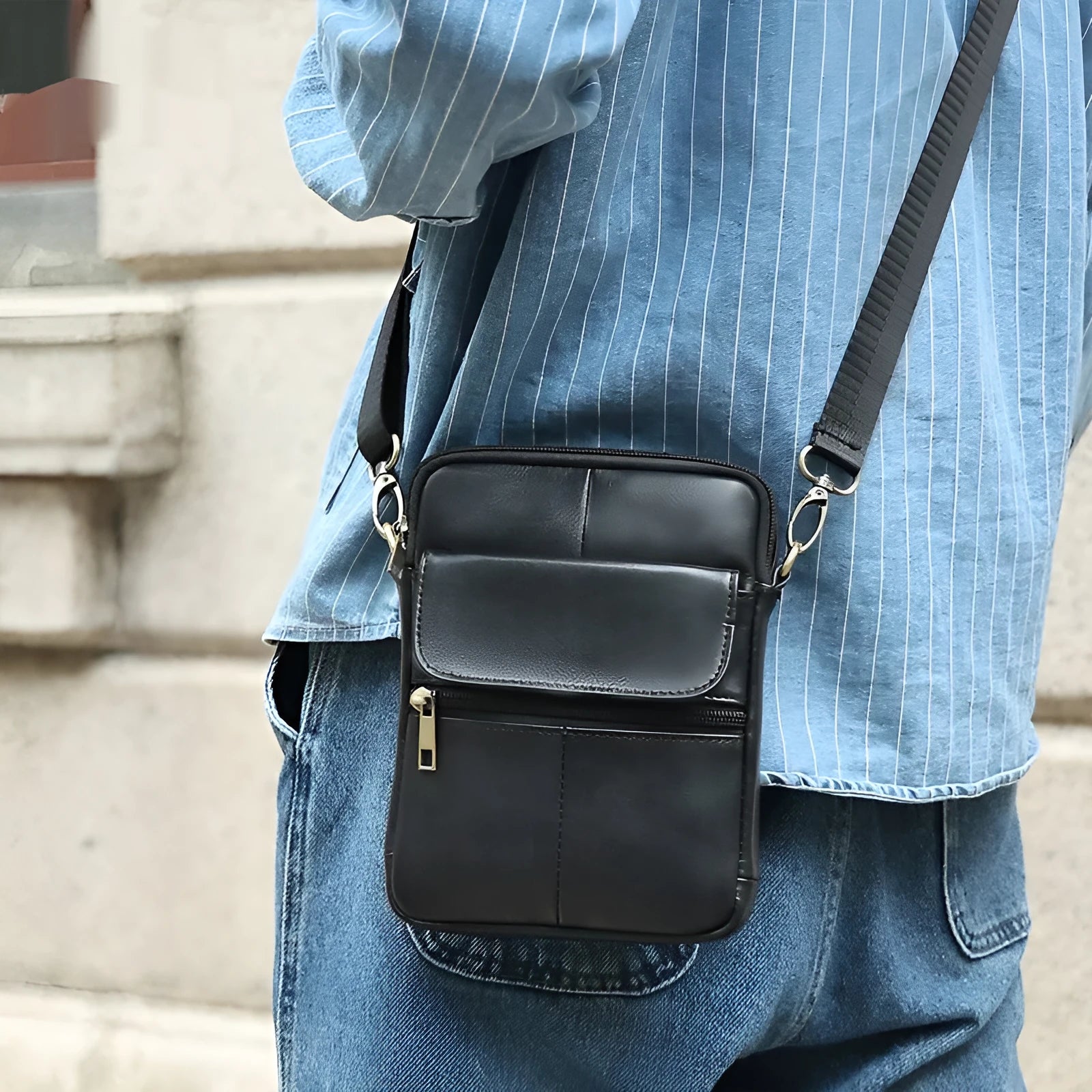 Men's brown genuine leather crossbody shoulder bag with visible stitching and a solid colour design.