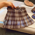 Girls' plaid pattern pleated A-line skirt in cotton blend fabric.