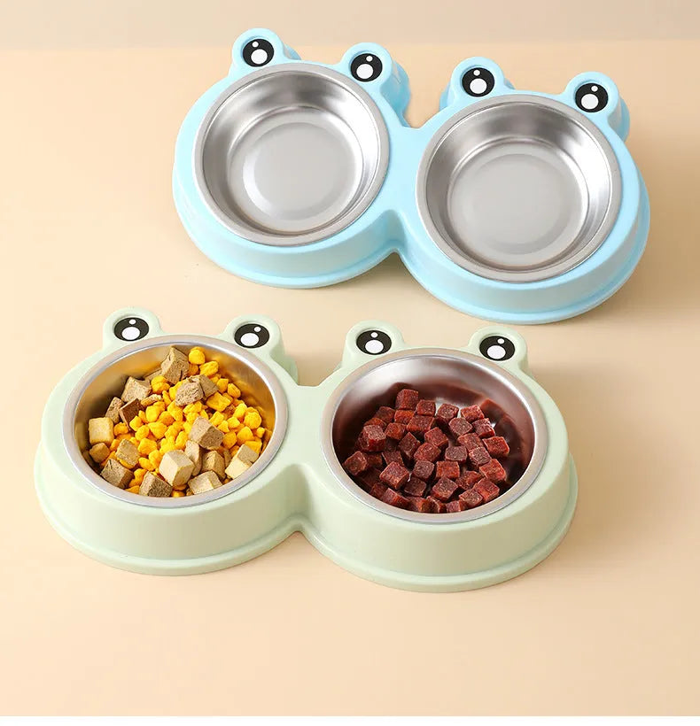 Blue frog-shaped pet double bowl with two stainless steel compartments for food and water