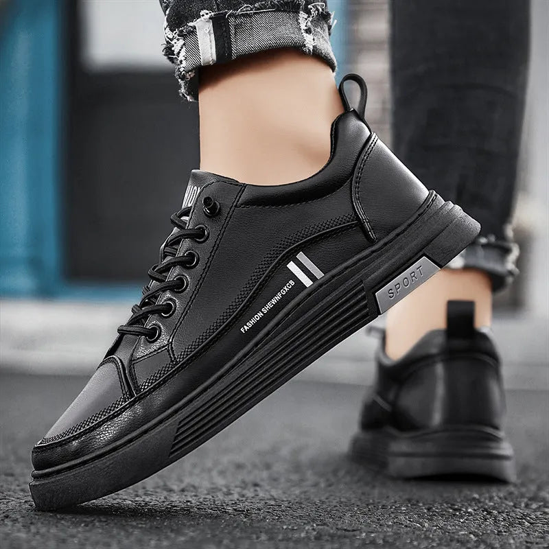 Men's white and black skateboard shoes with elastic band closure and rubber sole