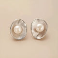 Gold-coloured geometric pearl stud earrings made from sterling silver with electroplated finish