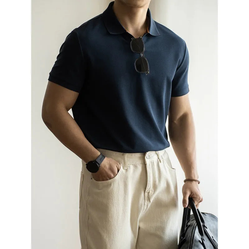 American-style cotton blend short-sleeved polo shirt in blue, shown in a regular fit for casual summer wear.
