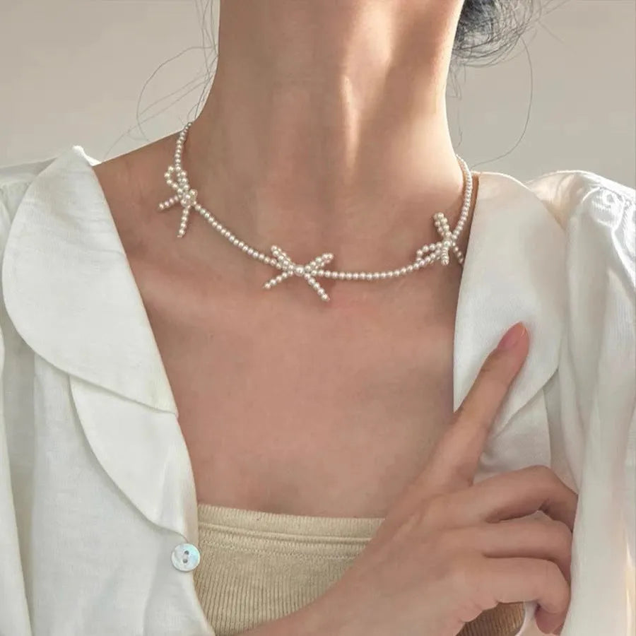 White bow design imitation pearl necklace for women with adjustable 31-40cm chain