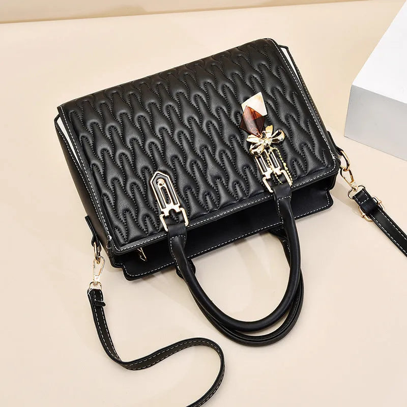 Women's polyester shoulder messenger bag showing large capacity and multiple pocket organisation