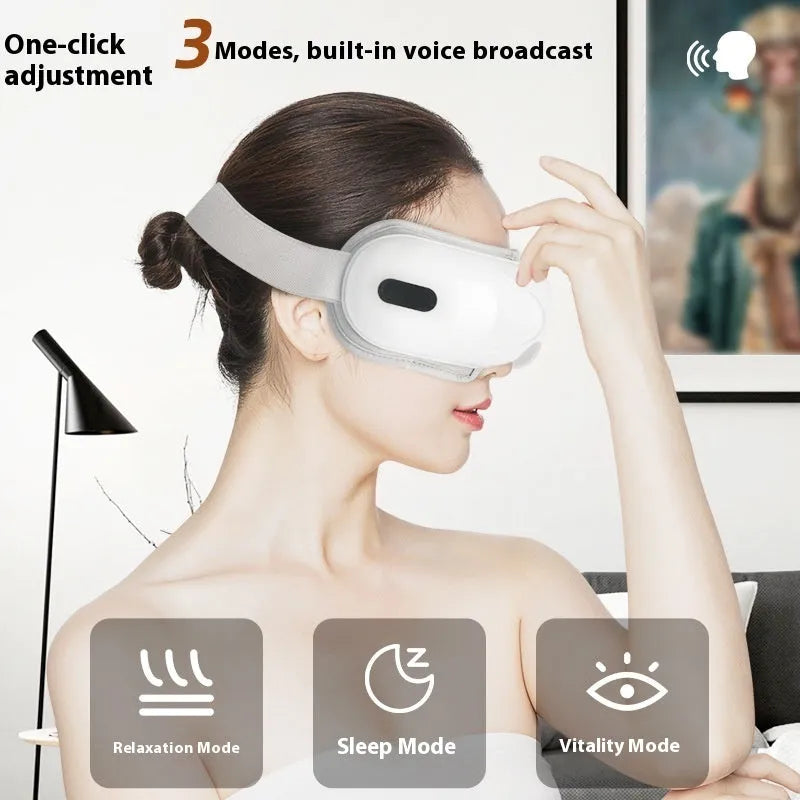 White rechargeable eye massager with airbag compression and heat therapy functions for relieving eye fatigue