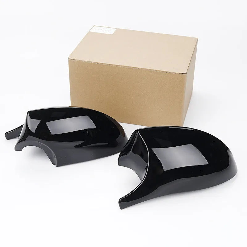 Pair of black ABS plastic rearview mirror housings for BMW 3 Series E90 replacement.