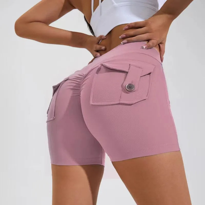Women's high waist hip lifting shorts with pockets in various colours for fitness activities