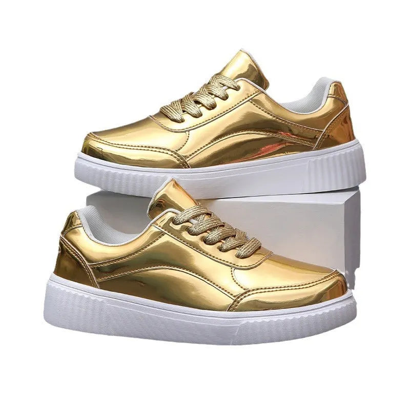 Thick-soled sequin platform sneakers in metallic gold colour with round toe