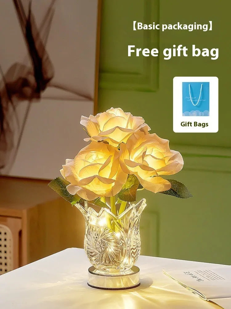 Modern crystal flowers design rechargeable touch table lamp with USB cable on a wooden surface.
